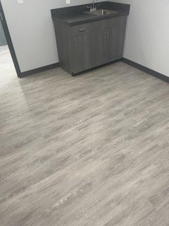 gray hardwood flooring with sink