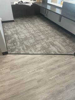 grey carpet design and hardwood floors