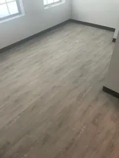Gray hardwood flooring installed